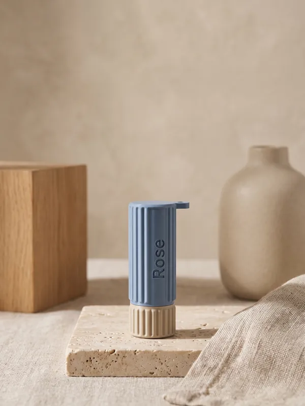 Blue fluted lip balm holder with the name Rose, sized to the stick in the Lip Balm Holders generator.