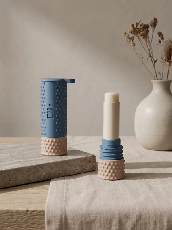 Blue holder with a dotted texture, its cap off, next to a lip balm.