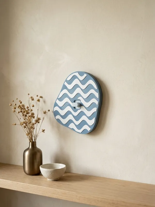 Blob-shaped switch plate with a wave pattern, made in the Switch Plates generator.